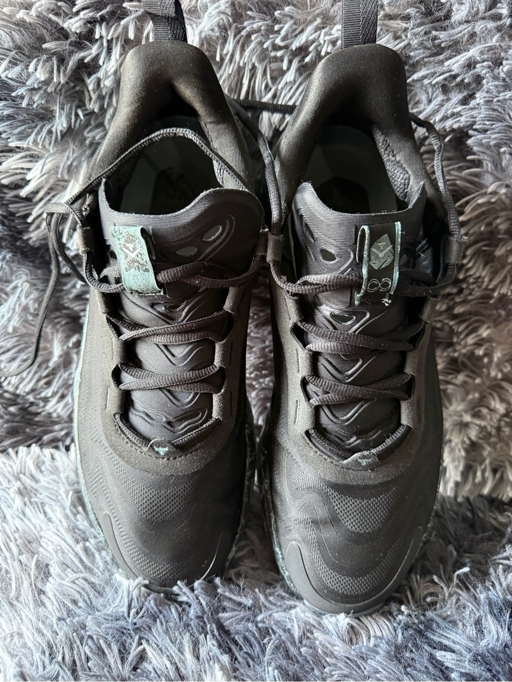 Under Armour Men's Black Sneakers with Teal Accents